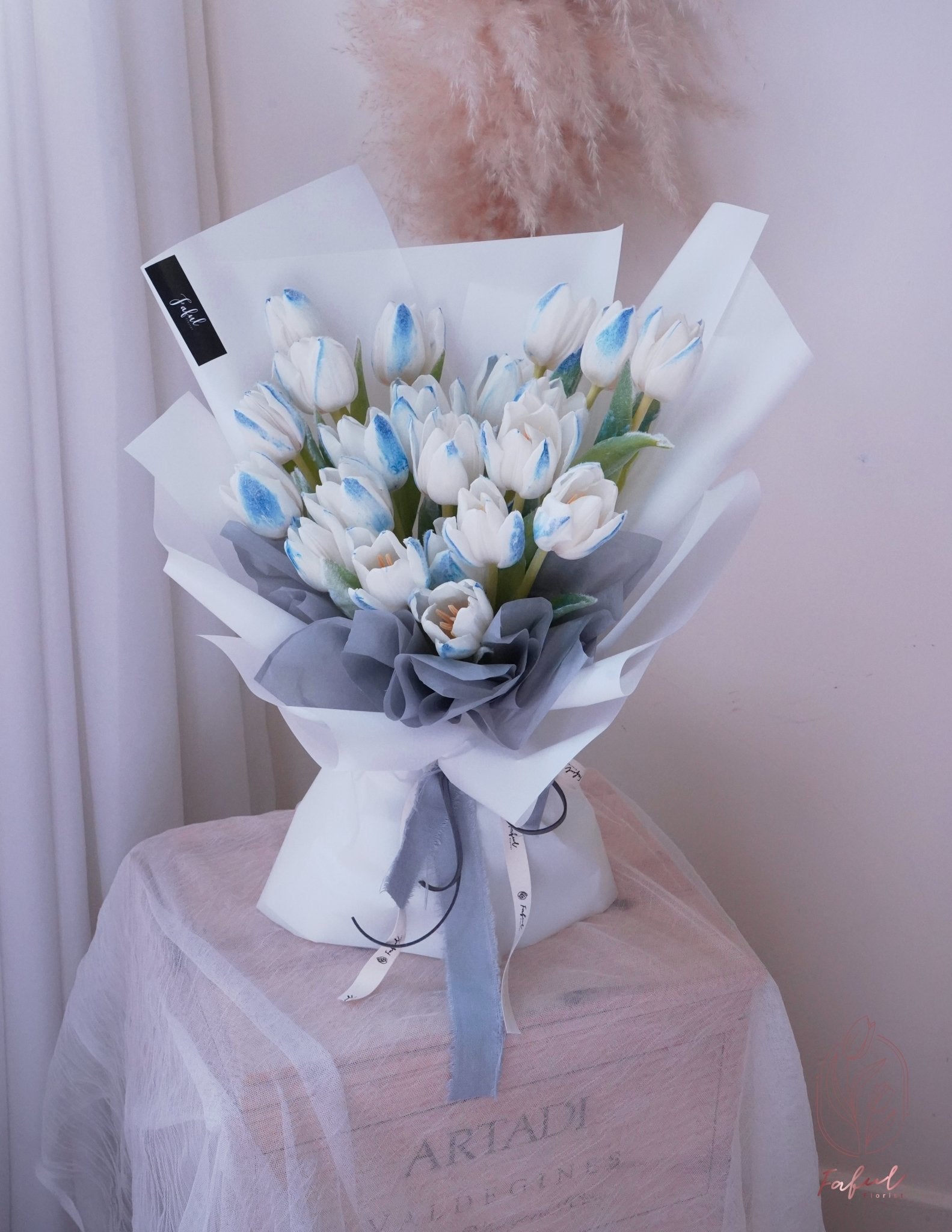 "Snowflake Flowers" - A delicate arrangement featuring frozen tulips reminiscent of snowflakes, perfect flowers for flower delivery in Hong Kong.4