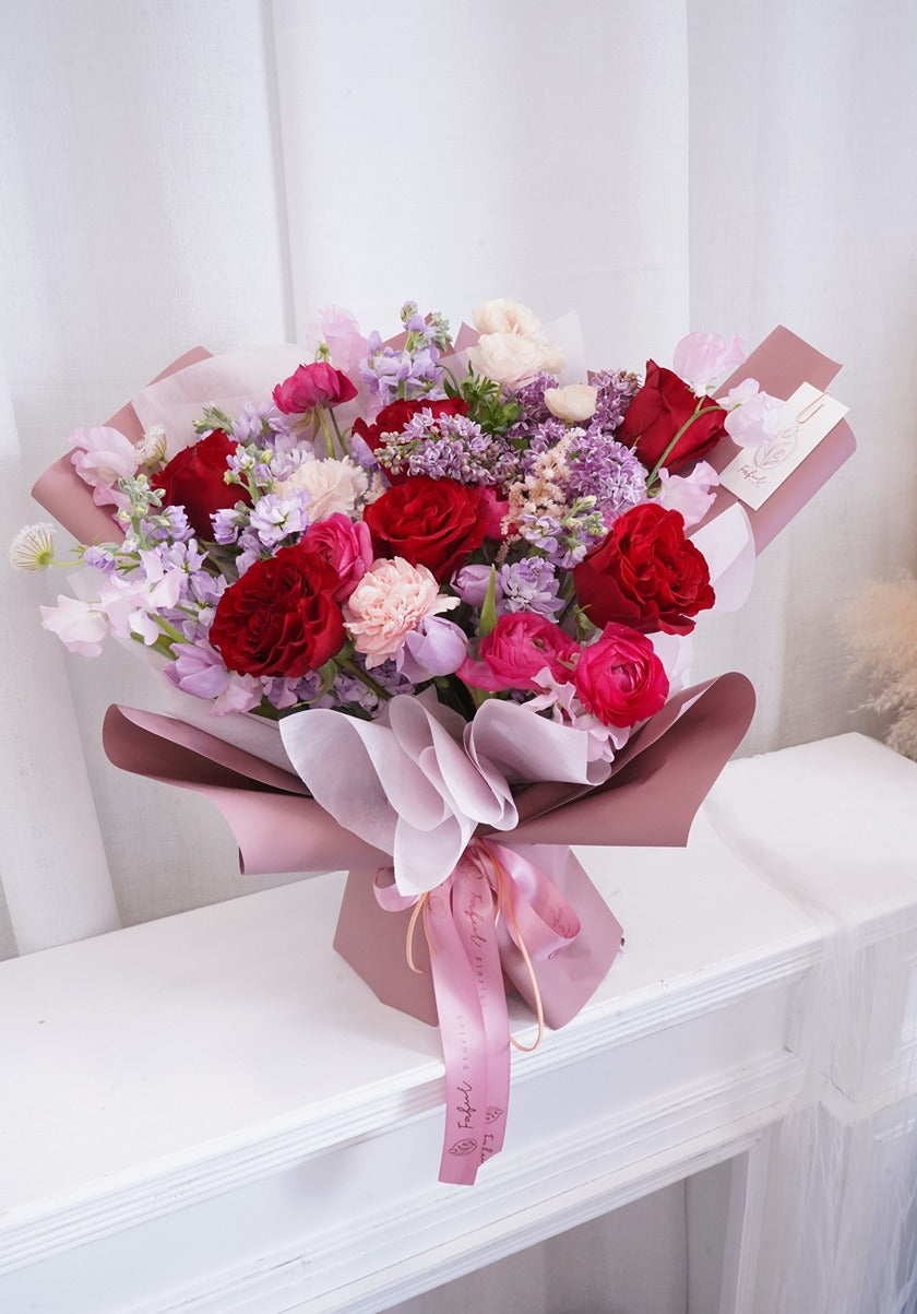 "Love You Flowers" - A declaration of love with a beautiful arrangement of red roses, perfect flowers for flower delivery in Hong Kong.