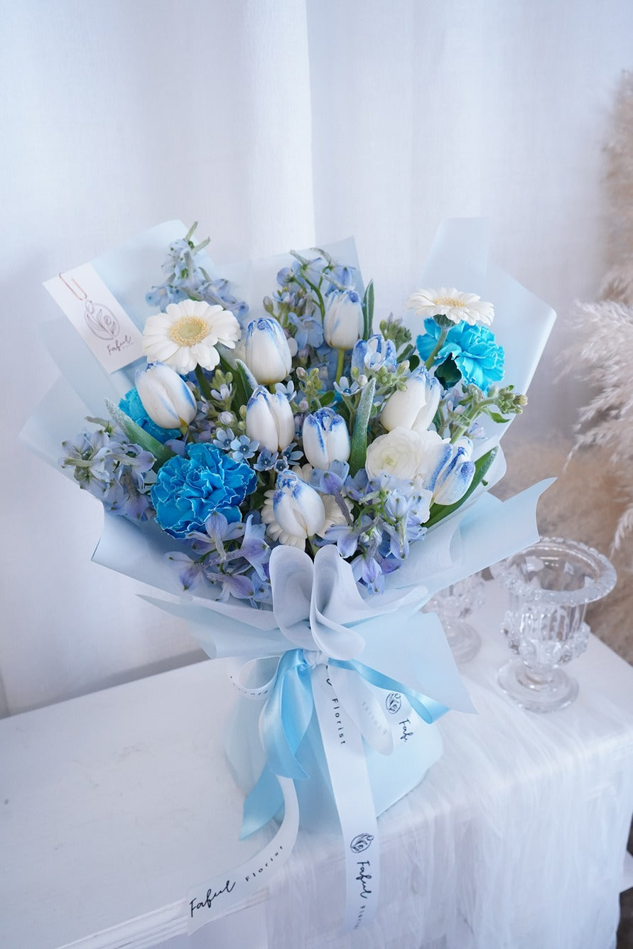 "Ice Blue" - A captivating arrangement of frozen tulips in a stunning shade of blue, available for flower delivery in Hong Kong.