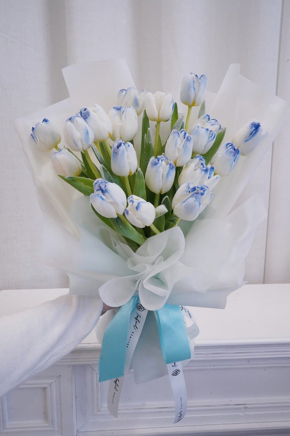 "Snowflake Flowers" - A delicate arrangement featuring frozen tulips reminiscent of snowflakes, perfect flowers for flower delivery in Hong Kong.